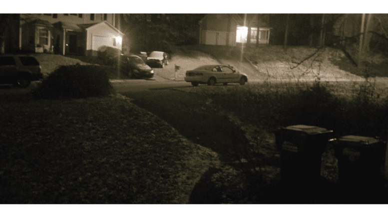 a night-time photo of snow on Brookside Drive in Mableton