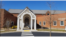 Front of Switzer Library, a brick building with a white columned entranceway