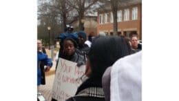 People holding signs at 2016 Black Lives Matter protest in Smyrna