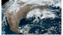 Satellite map of eastern United States showing a swirling mass of clouds