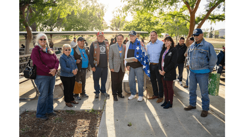 A group of members of the Cherokee Nation in a line for a photo