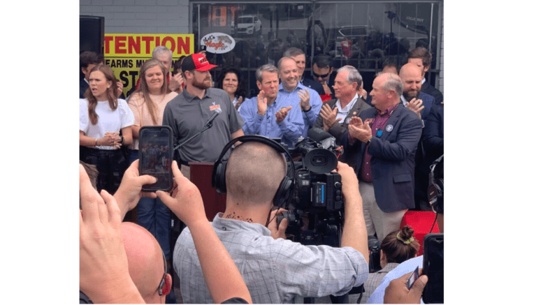 A crowd gathered at a press release with Gov. Brian Kemp to mark the passage of the recent gun law by Georgia GOP legislators