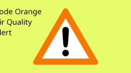 An alert triangle with "Code Orange Air Quaility Alert" printed on it