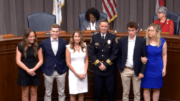 Cobb Police Chief Stuart VanHoozer and his family at the Cobb County BOC meeting