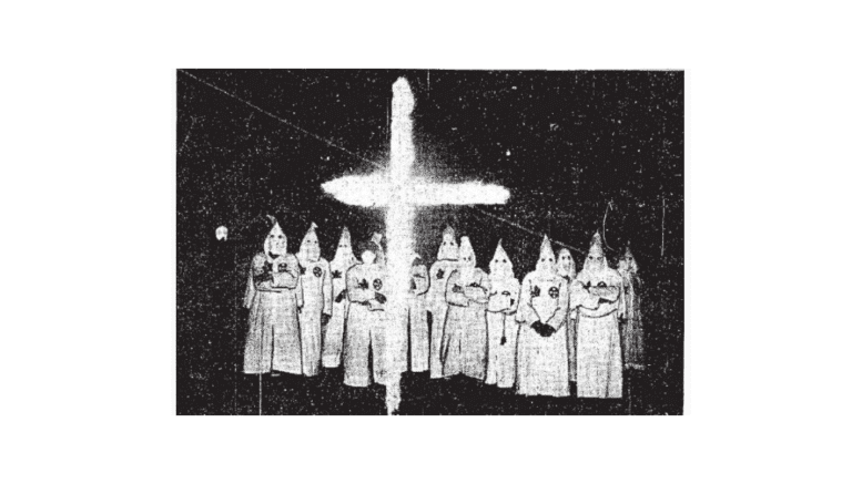 Klan rally with cross