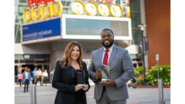 Dr. Melissa Wikoff and Jon Ingram holding awards