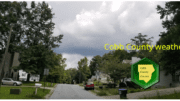 Cobb weather May 23: Photo of cloudy skies above a residential street
