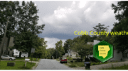 Cobb weather September 26: Photo of cloudy skies above a residential street