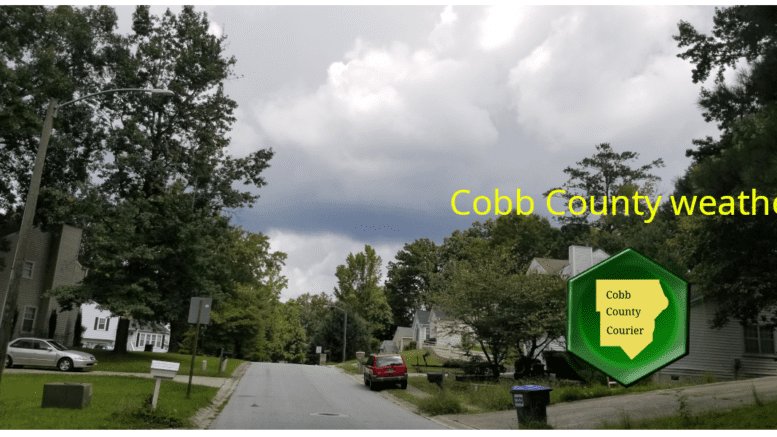 Cobb weather September 14: Photo of cloudy skies above a residential street