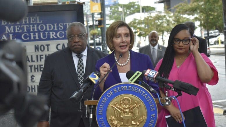 From left, Rev. John Foster of Big Bethel AME Church, Speaker Nancy Pelosi and Congresswoman Nikema Williams. Pelosi came to Atlanta to promote a Democratic measure aimed at restoring communities divided by unjust laws. Ross Williams/Georgia Recorder.