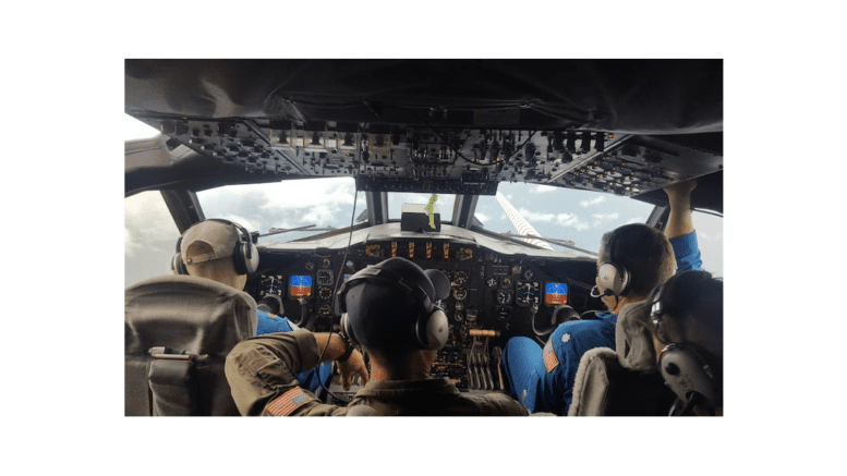 View from the cockpit of a plane flying into a hurricane