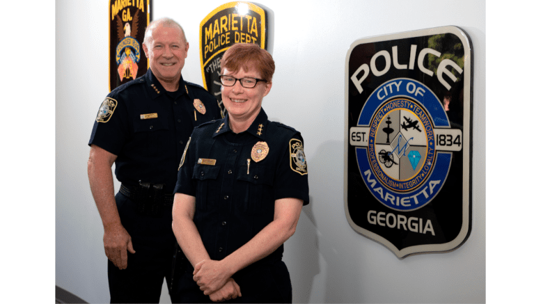 Newly promoted Deputy Police Chief Tanya Twaddell alongside Chief Marty Ferrell, both in uniform