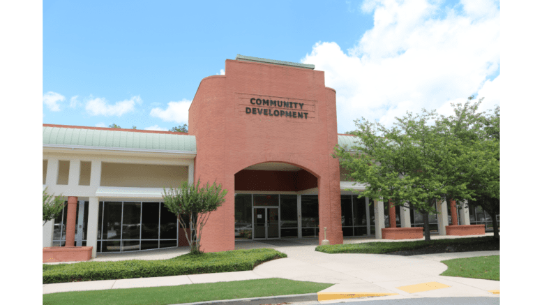 Brick building labeled "Community Development"