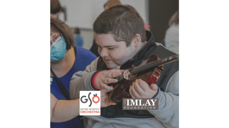 male child playing violin