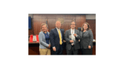 Michael Syrop (holding award), with Chief Judge Rob Leonard, Judge Ann Harris (left) and Judge Kimberly Childs.