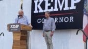 Mike Pence and Brian Kemp onstage