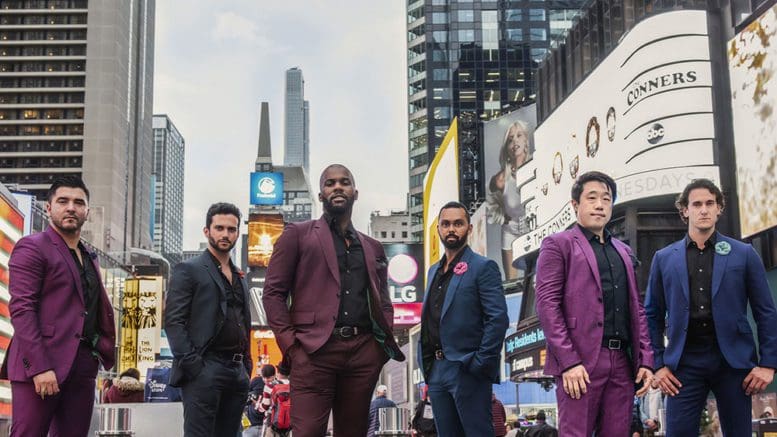 A diverse group of young men on a city street