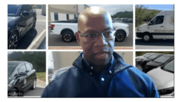 Cobb Fleet Director Al Curtis in front of wall of photos of county vehicles