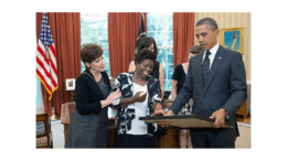 Lois Curtis, smiling, with Barack Obama