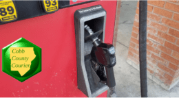 Gasoline pump resting in its cradle