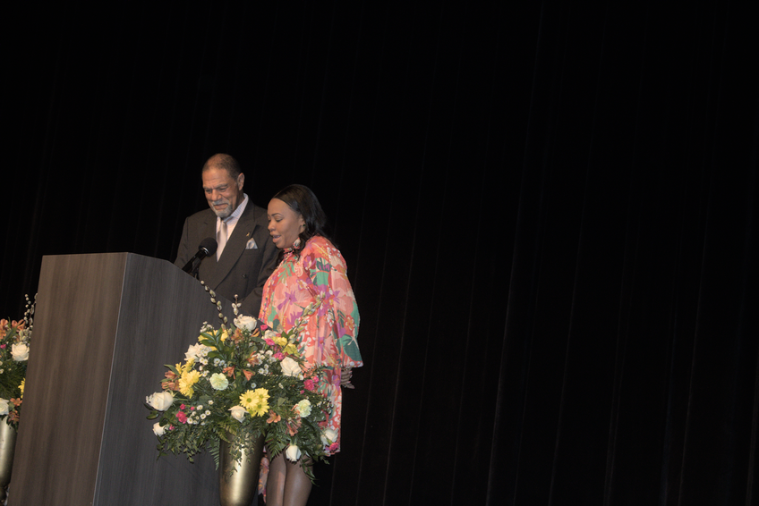 Michael Murphy and LaTonia Long speak at podium