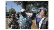 Monica DeLancy, Cobb SCLC President Dr. Ben Williams, and Cobb SCLC Field Director Rich Pellegrino outside at rally