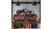 A large stack of leather bags of various types: purses, luggage etc