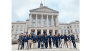A group of high school students arranged for photo in front of the Georgia Capitol