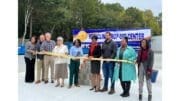 Cobb Chairwoman Lisa Cupid cuts ribbon with Commissioners JoAnn Birrell (L) and Monique Sheffield (R)