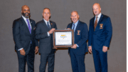 Mayor Derek Easterling and Kennesaw Police Chief Bill Westenberger hold CALEA certificate