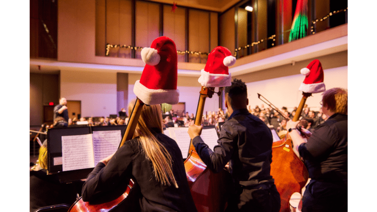 Upright stringed instruments with Santa caps