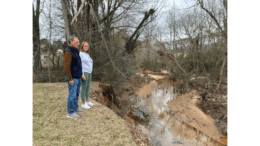 Jagger and Sullivan looking down into Nickajack Creek