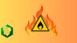 A fire danger warning triangle surrounded by flame; the Cobb County Courier logo to the left-hand side