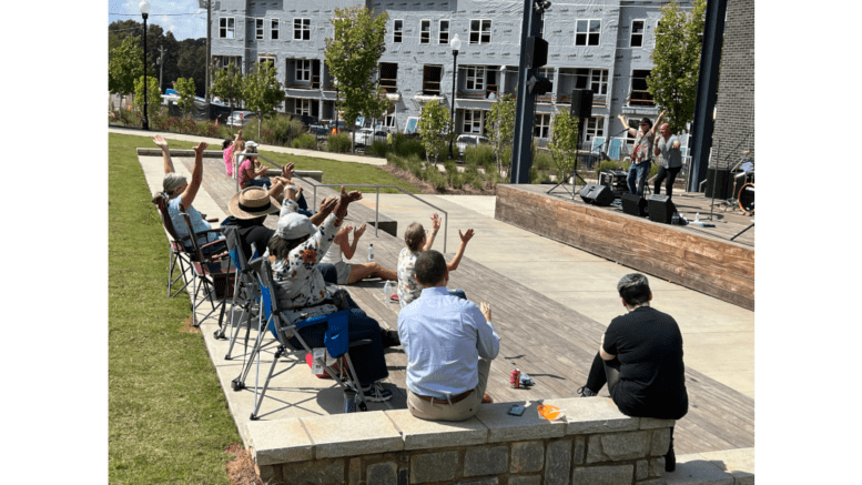 A lunchtime crowd enjoys the pop/rock setlist performed by Incentive during the City of Powder Springs' Brown Bag Lunch Concert offering on Sept. 21, 2023. Held each September in previous years, the city's Brown Bag Lunch Concert Series is adding in 2024 four April bookings ahead of its annual autumn return, with the free concerts taking place from noon to 1 p.m. each Thursday in both April and September. Photo courtesy Jon Gargis/City of Powder Springs