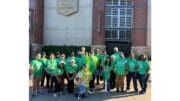 Large group photo of volunteers on Earth Day at Truist Park