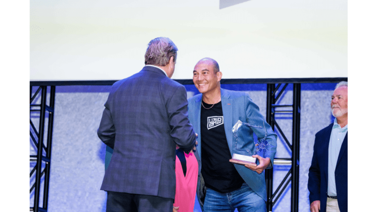 Yalo CEO Arnold Huffman accepting the Small Business of the Year award