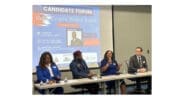 L-r Vickie Benson, Leroy Tre’ Hutchins, Laura Judge, Andrew Cole seated at a table in front of the Cobb school board candidates forum