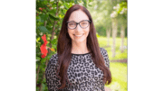 Photo of Jessica Guthrie, smiling, in outdoor setting