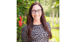 Photo of Jessica Guthrie, smiling, in outdoor setting