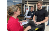 Melissa Marten pictured with two employees named in the lawsuit, Daniel Vehar and Zach Alderson.