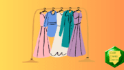 A rack of clothing, mostly dresses