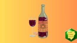 Color drawing of a bottle of red wine with a nearly full wineglass alongside it