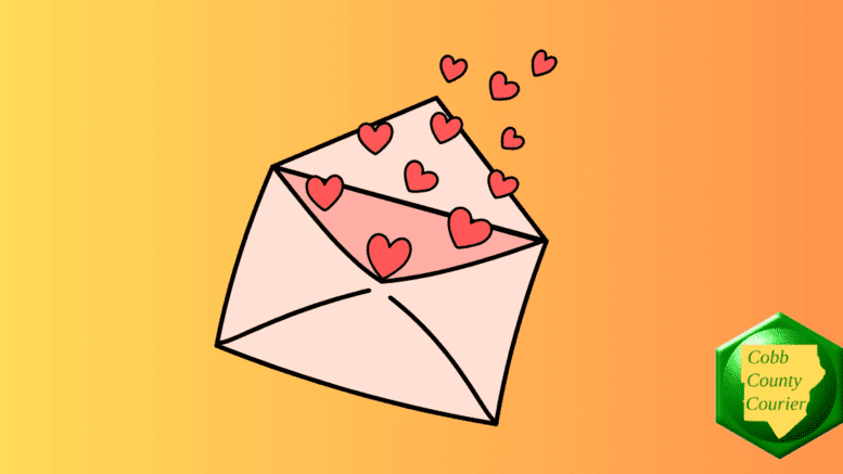 An envelope with valentine hearts streaming out