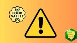 A round "food safety" label beside a yellow alert triangle