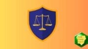 A gold scales of justice on a blue shield