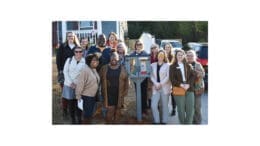 Cobb Collaborative and friends at the ribbon-cutting for a Little Free Library installation