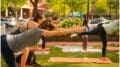 Women outdoors practicing yoga