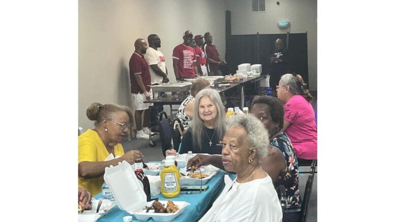 Meals served by Kappa Alpha Psi at the Community Spot in Mableton