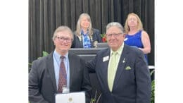 Barry Krebs accepting scrapbook award for the South Cobb Lions Club