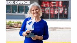 Nurdan Cornelius holding award